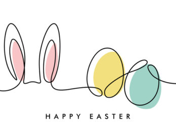 Zu sehen sind zwei Hasenohren und zwei Ostereier und der Schriftzug Happy Easter